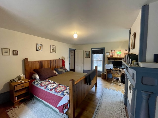 bedroom featuring hardwood / wood-style floors