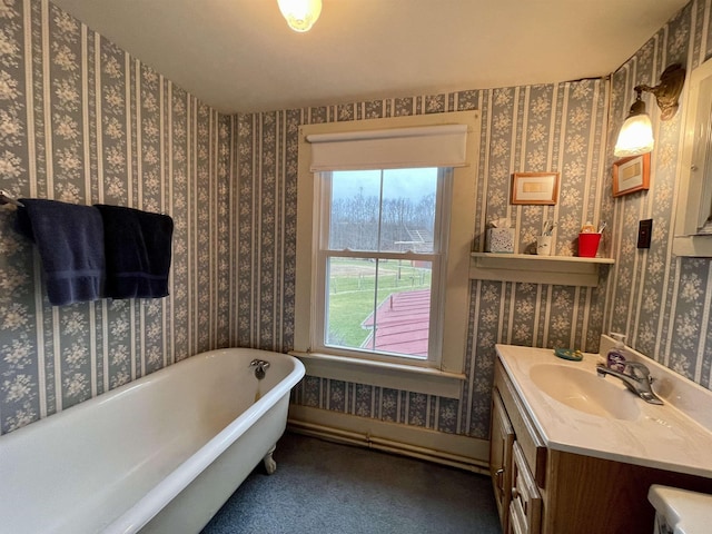 bathroom featuring a bathing tub and vanity