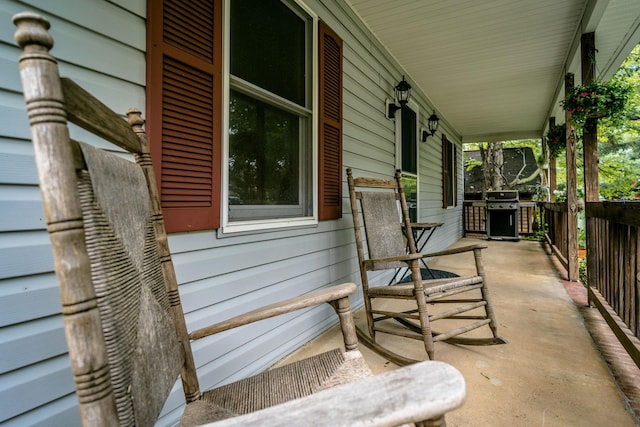 view of patio with grilling area and covered porch