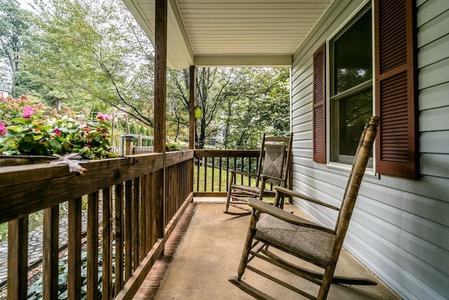 balcony featuring a porch