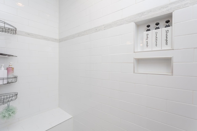 interior space with a tile shower