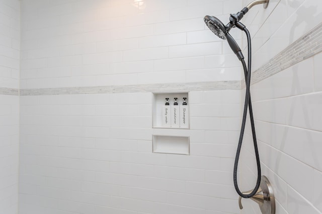 details with a tile shower