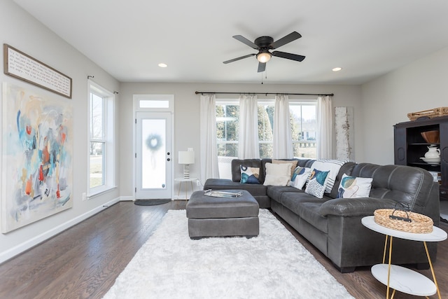 living room with recessed lighting, a ceiling fan, dark wood-style flooring, and baseboards
