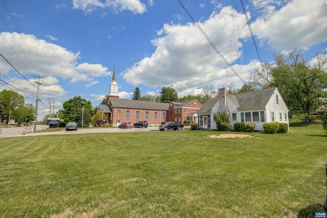 view of front of home with a front lawn