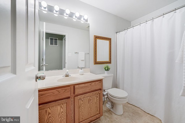 full bath featuring tile patterned flooring, visible vents, vanity, and toilet