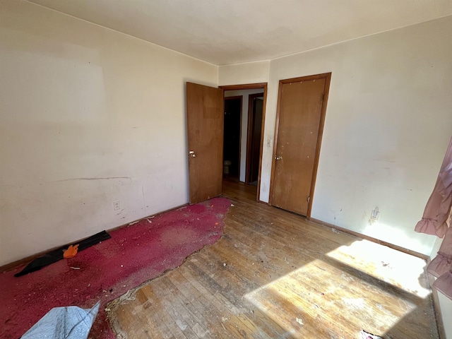 unfurnished bedroom featuring light hardwood / wood-style flooring