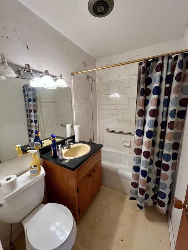 full bathroom featuring vanity, toilet, concrete floors, and shower / bath combo with shower curtain