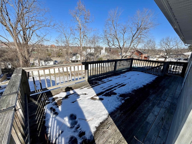 view of snow covered deck