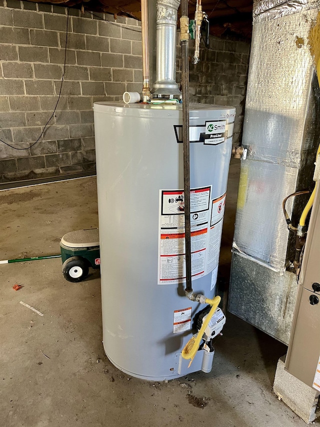 utility room featuring water heater and heating unit