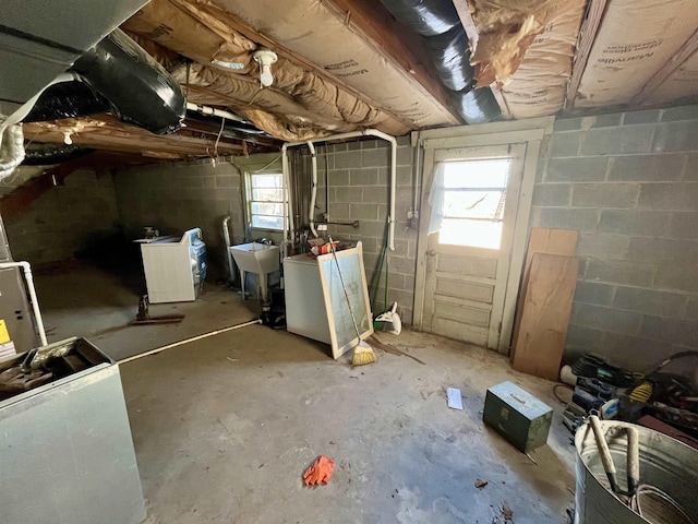 interior space featuring washer / clothes dryer and sink