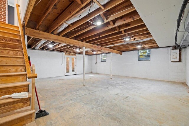 basement featuring stairs