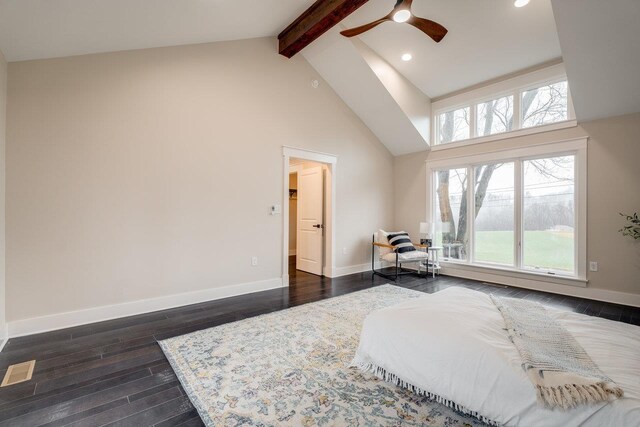 bedroom with beamed ceiling, ceiling fan, dark wood-type flooring, and high vaulted ceiling