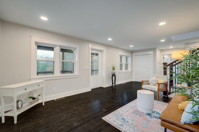 interior space with dark hardwood / wood-style floors