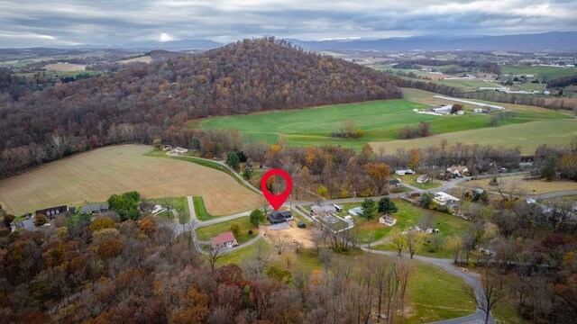 bird's eye view featuring a mountain view and a rural view