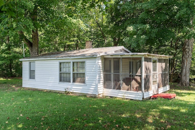 exterior space featuring a lawn