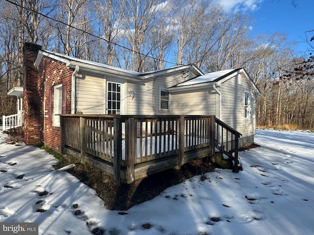 exterior space featuring a wooden deck