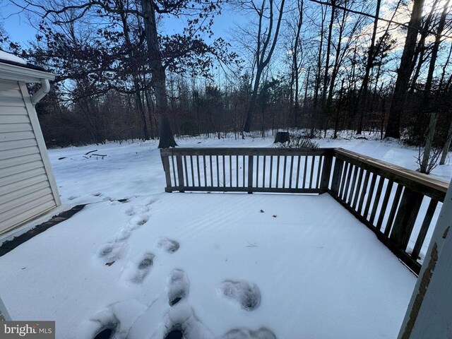 view of snow covered deck