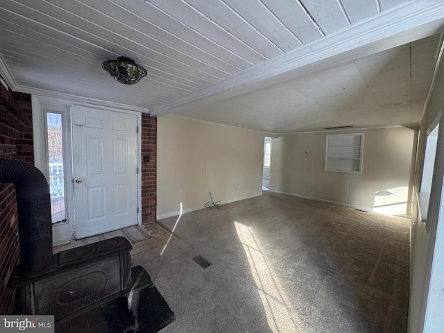 foyer with a wood stove