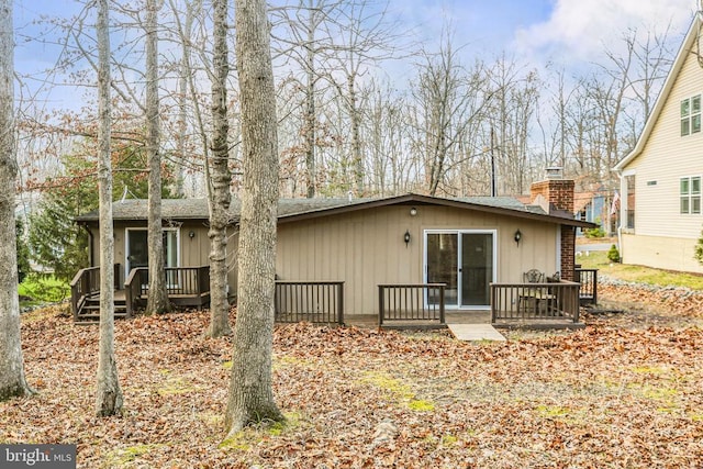 rear view of house with a deck