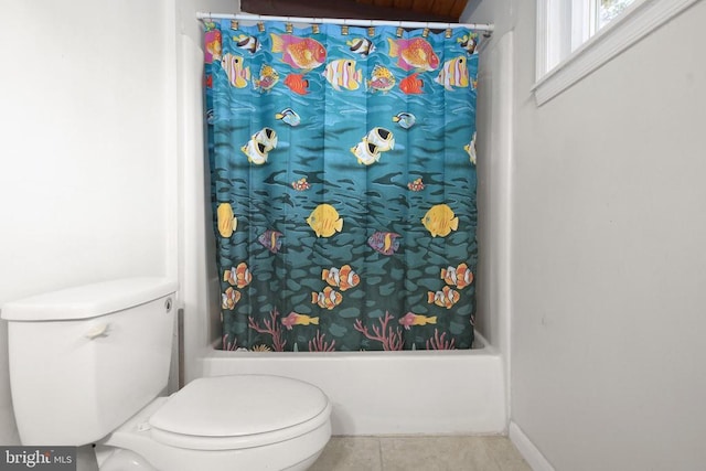 bathroom featuring tile patterned floors and toilet