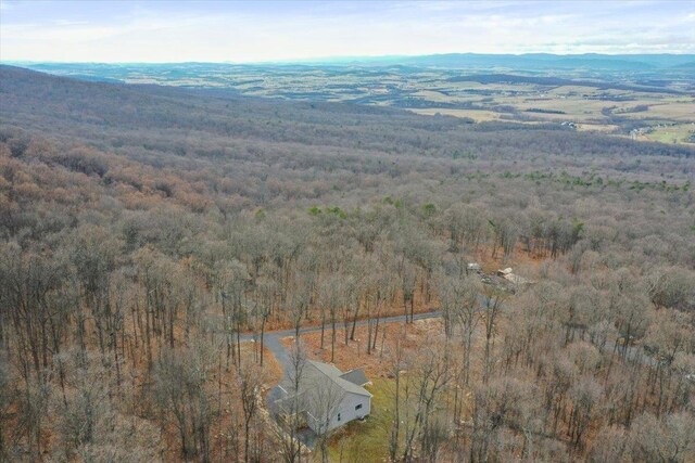 drone / aerial view featuring a mountain view