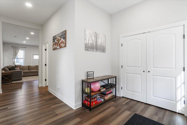 hallway featuring dark hardwood / wood-style floors