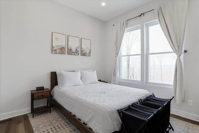 bedroom with light wood-type flooring