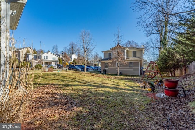 view of yard with a residential view