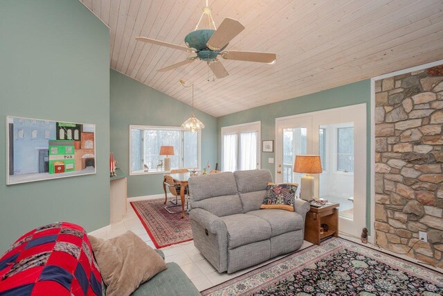 living room with light tile patterned floors, ceiling fan with notable chandelier, vaulted ceiling, and wooden ceiling