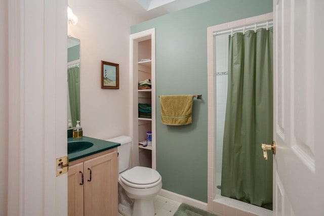 bathroom with vanity, toilet, and a shower with shower curtain