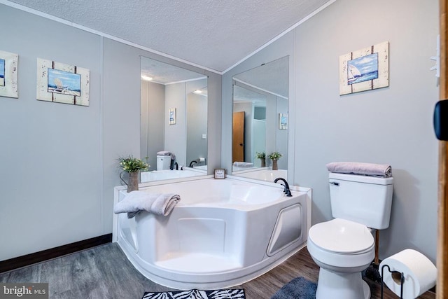 bathroom featuring hardwood / wood-style flooring, crown molding, a bath, and a textured ceiling