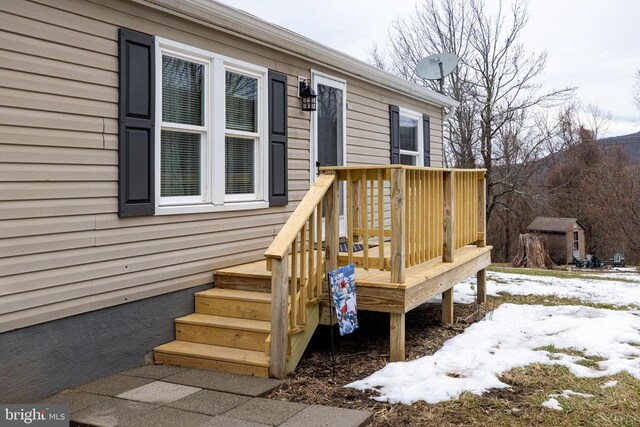 view of snow covered deck