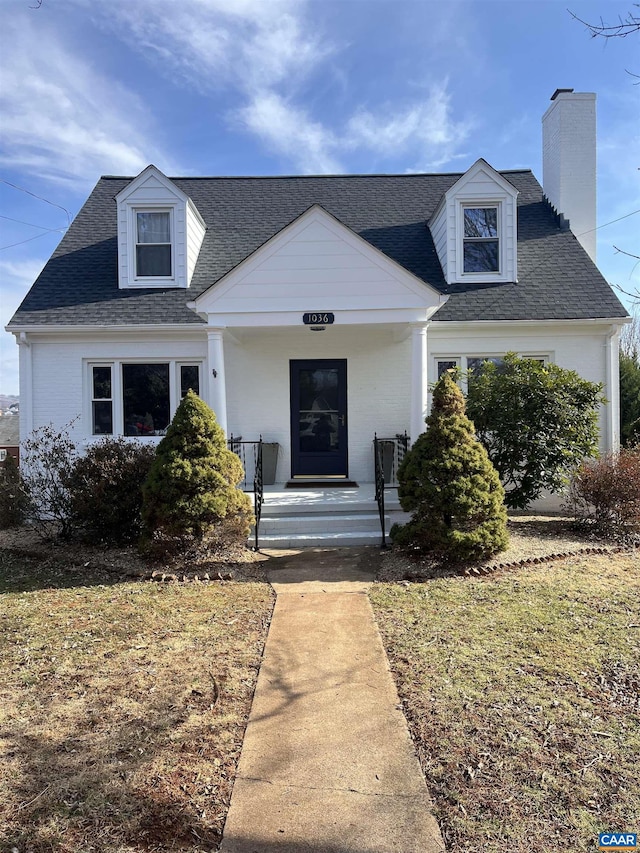 view of new england style home