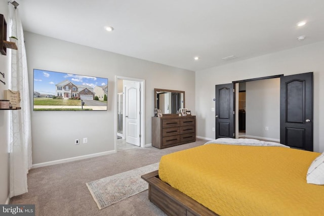 bedroom featuring baseboards, carpet flooring, ensuite bath, and recessed lighting