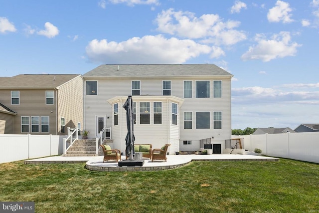 back of property with a lawn, stairway, a patio, and a fenced backyard
