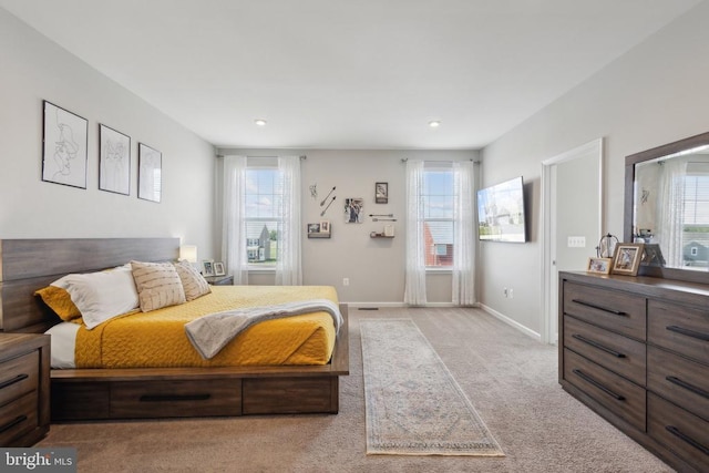 bedroom featuring recessed lighting, baseboards, and carpet floors