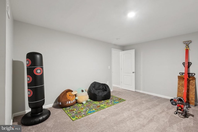playroom with baseboards and carpet floors
