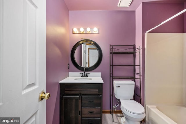 full bathroom featuring shower / tub combination, toilet, vanity, and baseboards