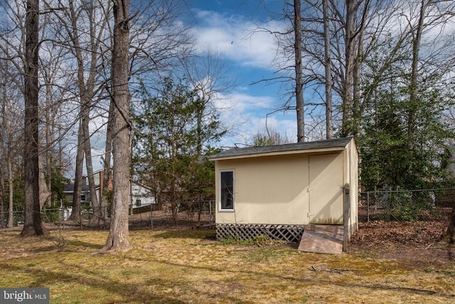 view of shed featuring a fenced backyard