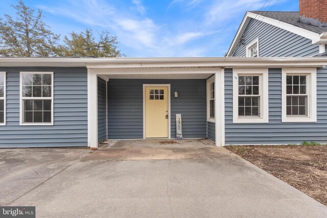 basement with hardwood / wood-style flooring and ceiling fan