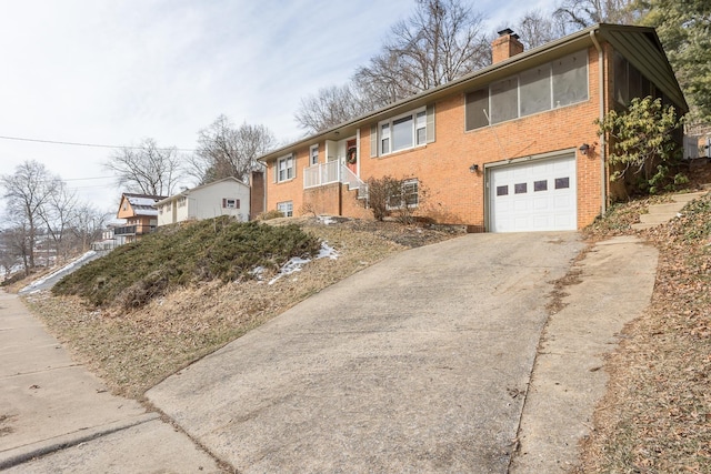 split foyer home featuring a garage