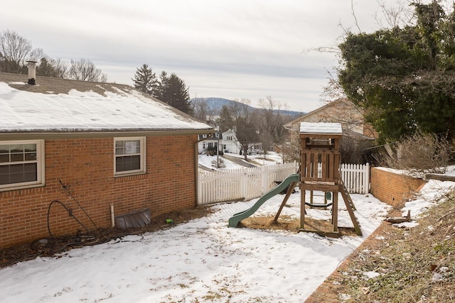 view of snow covered playground