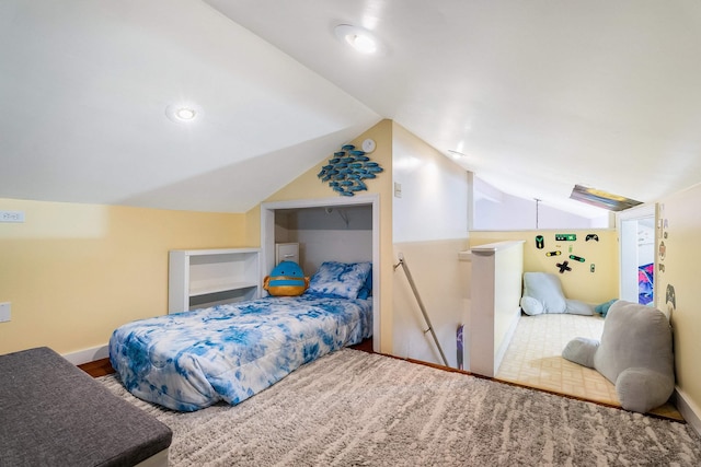 bedroom featuring lofted ceiling