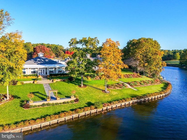 birds eye view of property featuring a water view