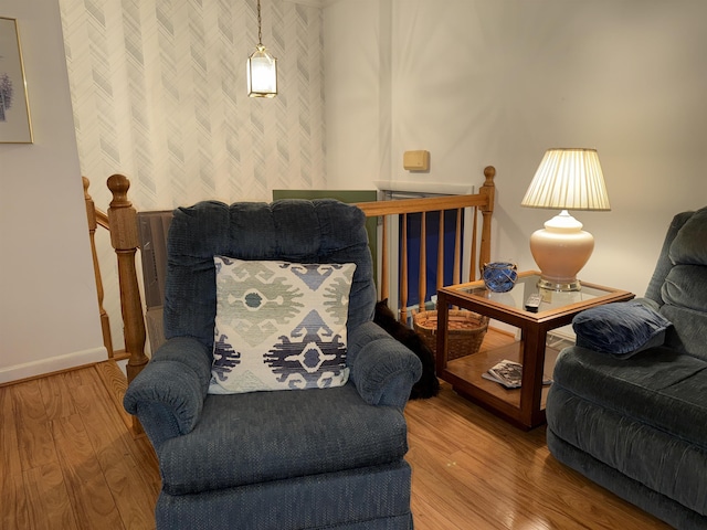 sitting room featuring wood-type flooring