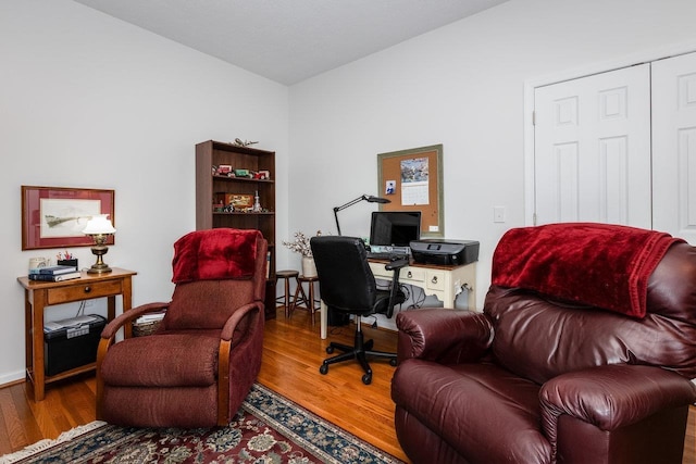 home office featuring wood finished floors