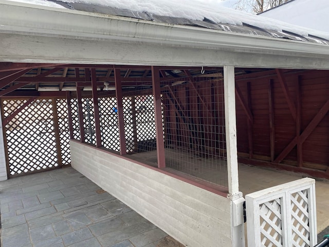 wooden terrace with an outbuilding