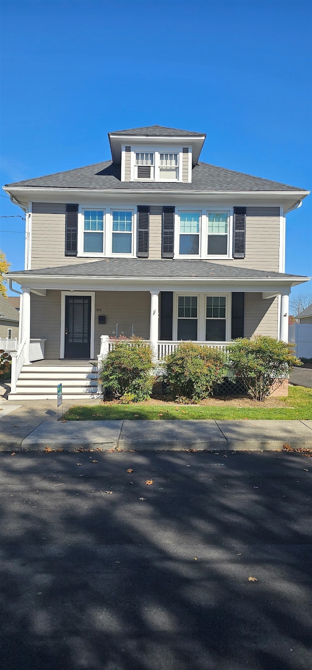 traditional style home featuring a porch