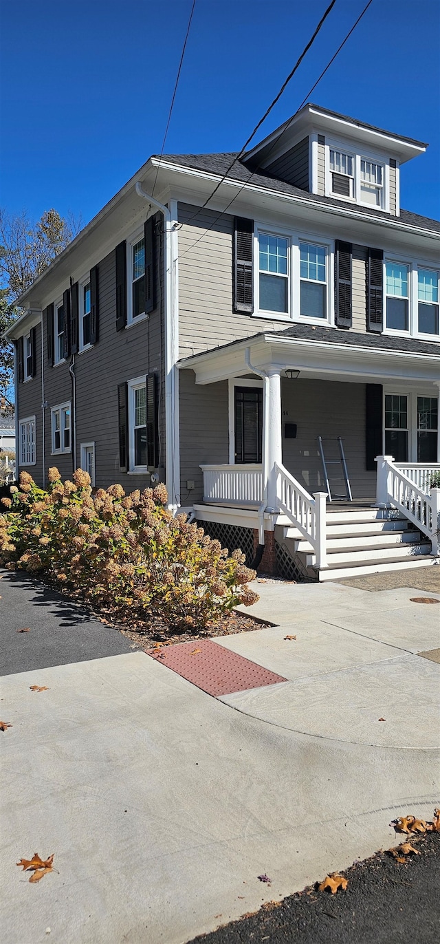 view of front of home featuring covered porch