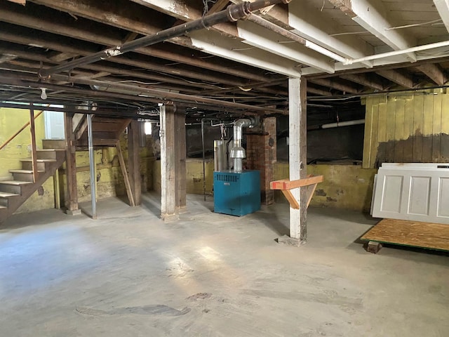 unfinished basement featuring stairway